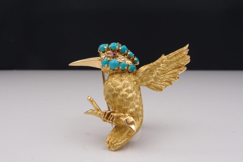 "King Fisher" brooch , by Wolfers , 18 k gold , turquoise .